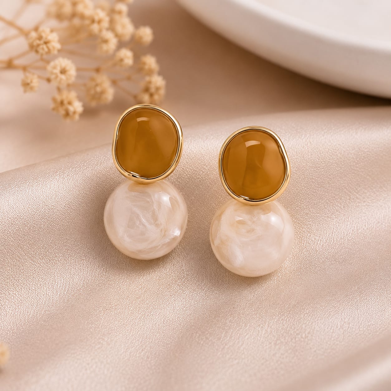 amber pearl harmony earrings styled to highlight balanced design with pearls and amber tones