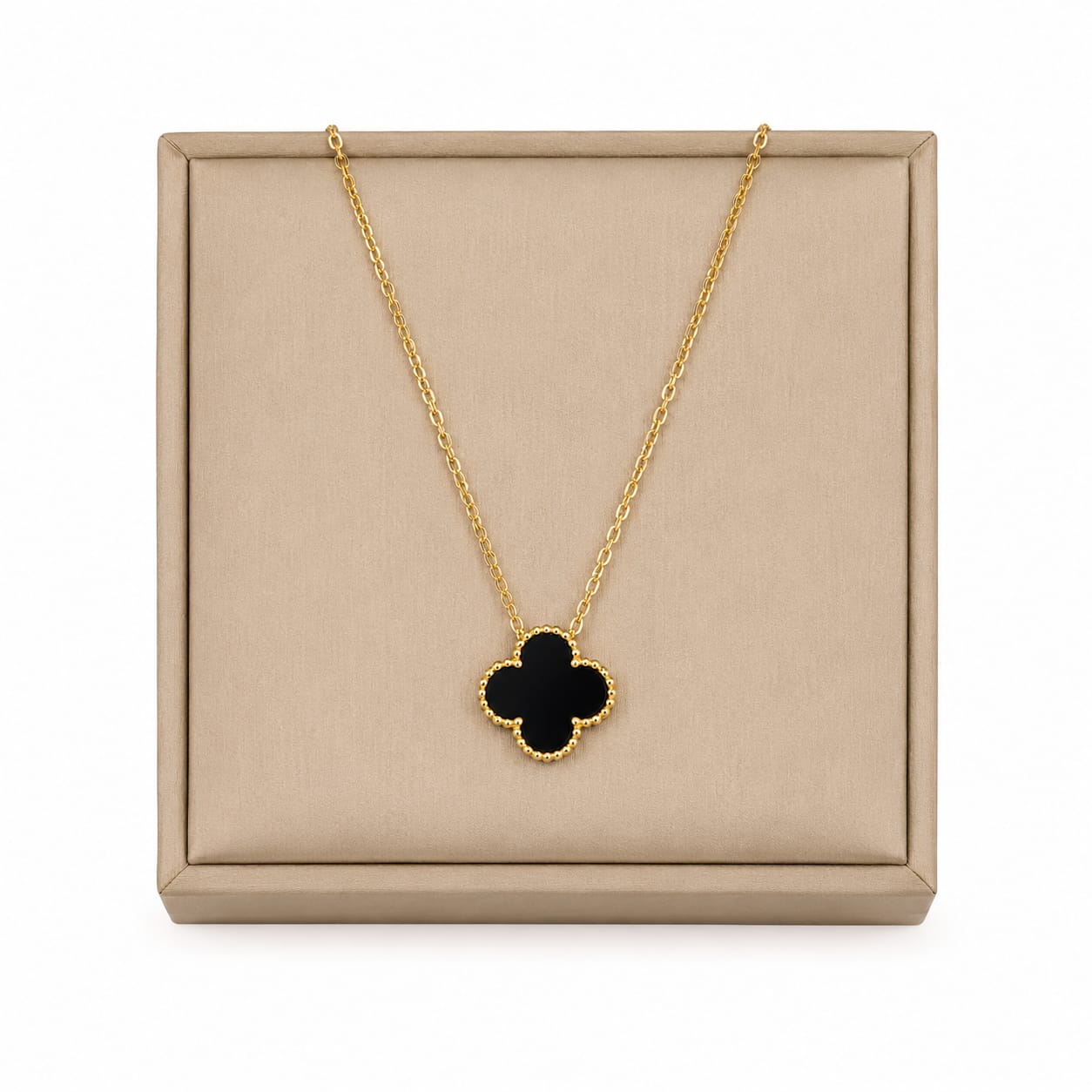 black clover pendant necklace styled on soft background highlighting elegant and modern design