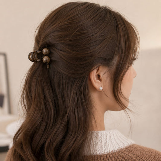 cocoa pearl hair claw clip featuring neutral brown tone with delicate pearl details and secure grip