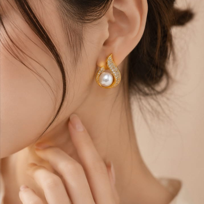 crystal pearl swirl earrings featuring elegant twisted design with pearls and sparkling crystals