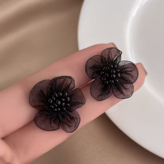 midnight bloom mesh flower stud earrings styled to highlight bold yet delicate flower silhouette