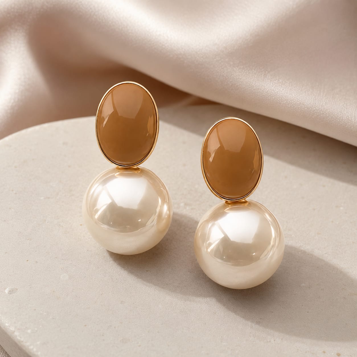 pearl drop statement earrings styled to highlight graceful movement and classic elegance