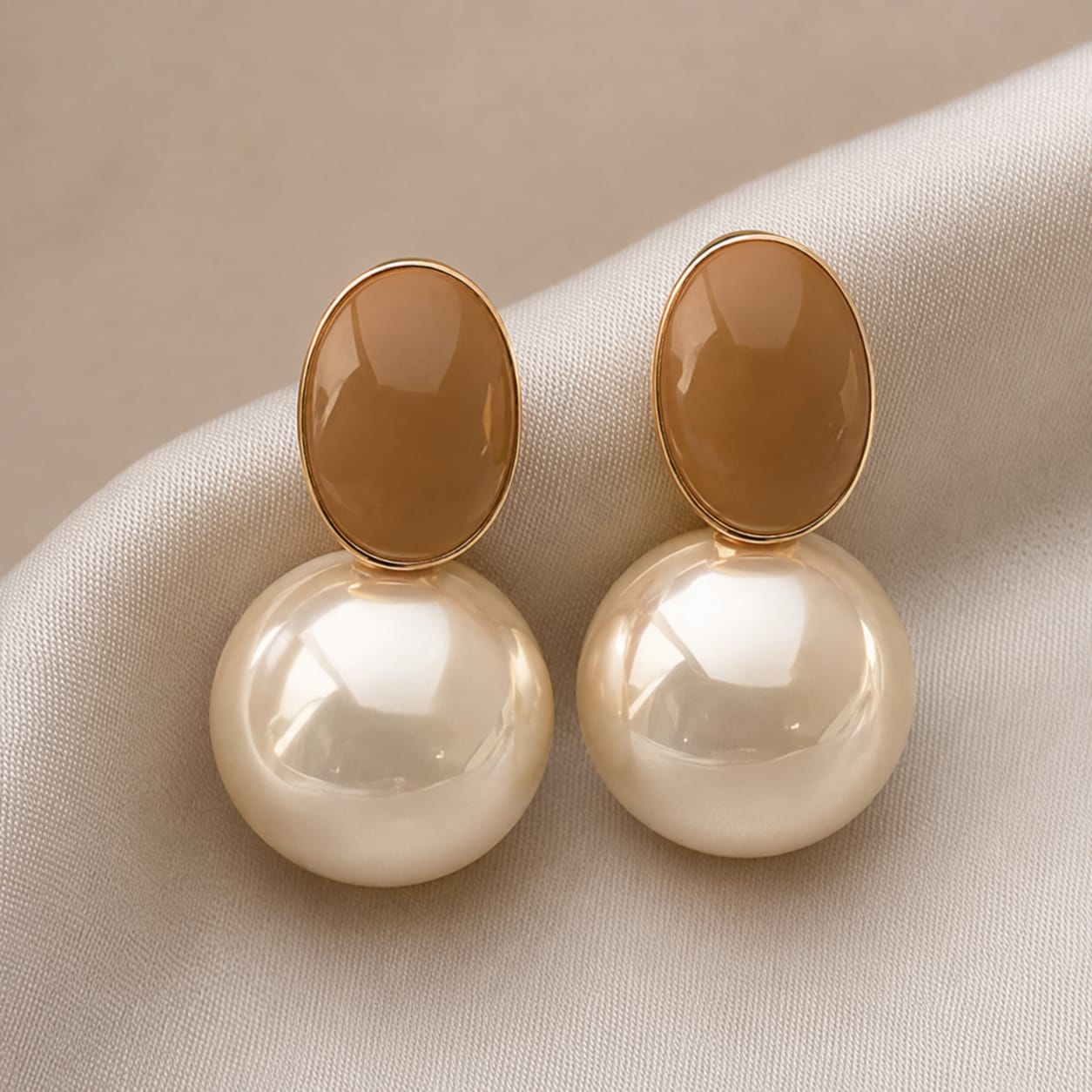 pearl drop statement earrings featuring smooth pearls in a timeless and elegant drop design