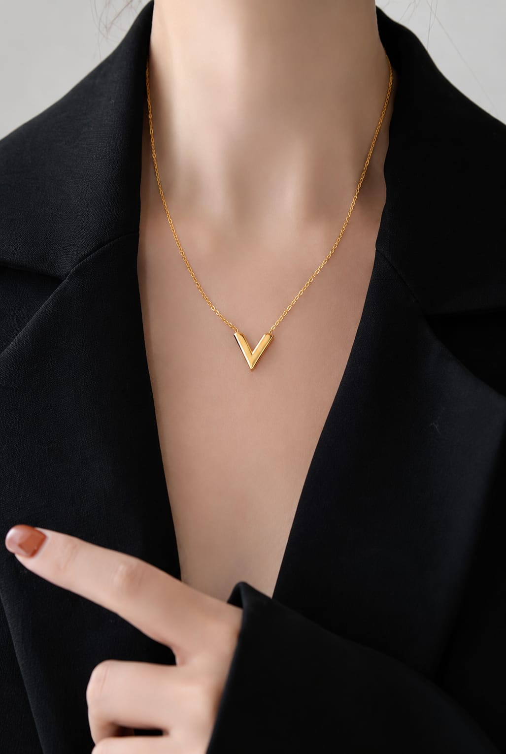 Minimal V pendant necklace in gold finish on chain elegant everyday jewelry piece