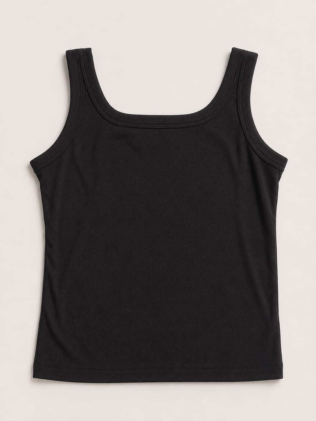 black ribbed tank top with a fitted stretch design and modern everyday style by NUR