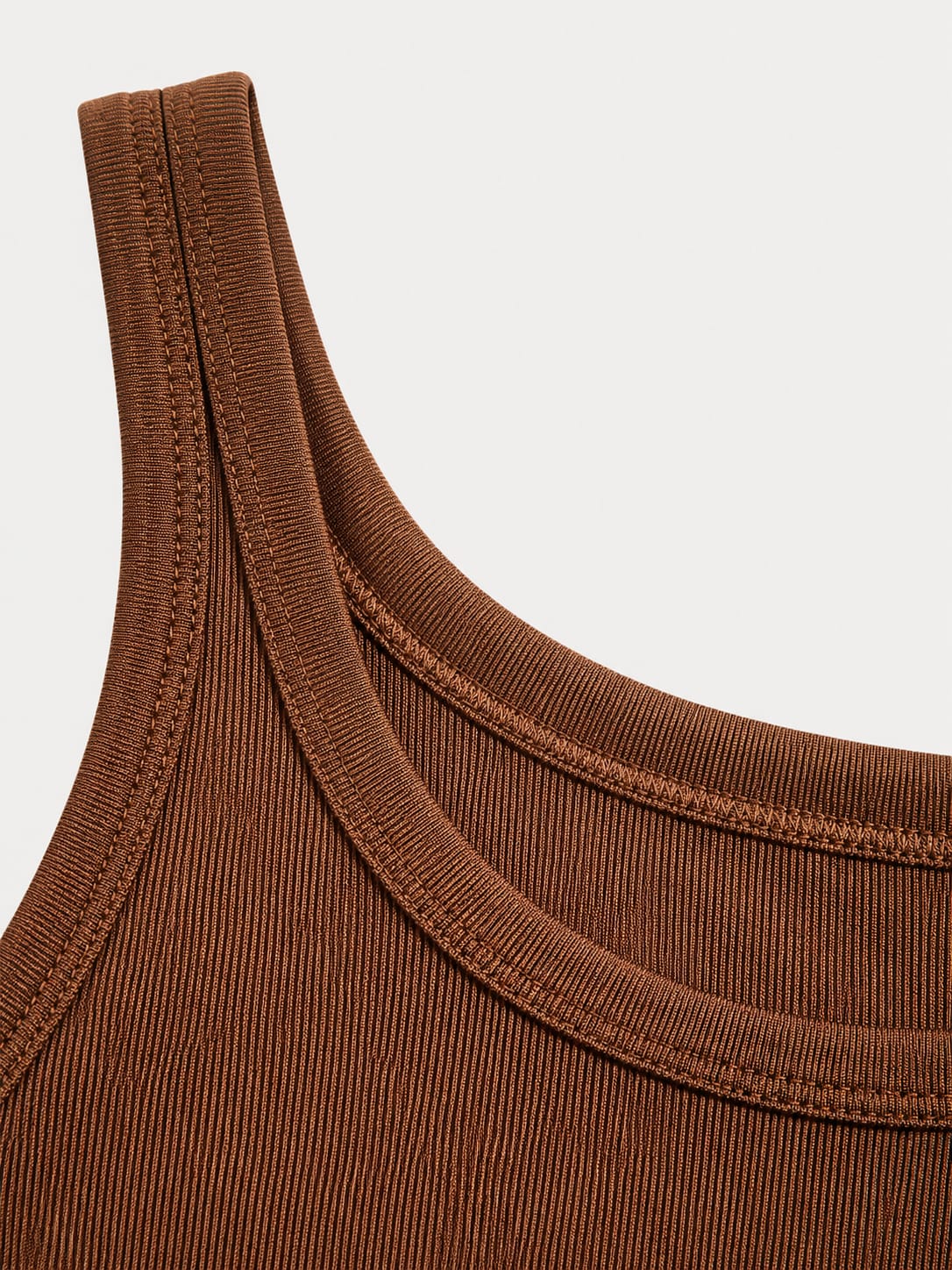 brown ribbed tank top with a fitted stretch design and modern everyday style by NUR