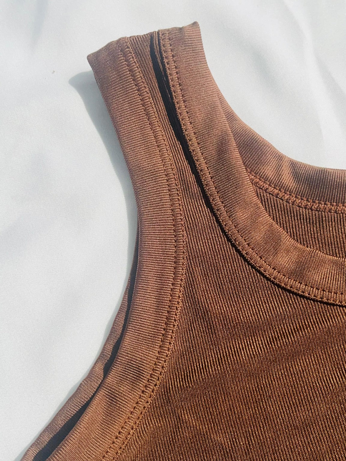 brown ribbed tank top with a fitted stretch design and modern everyday style by NUR