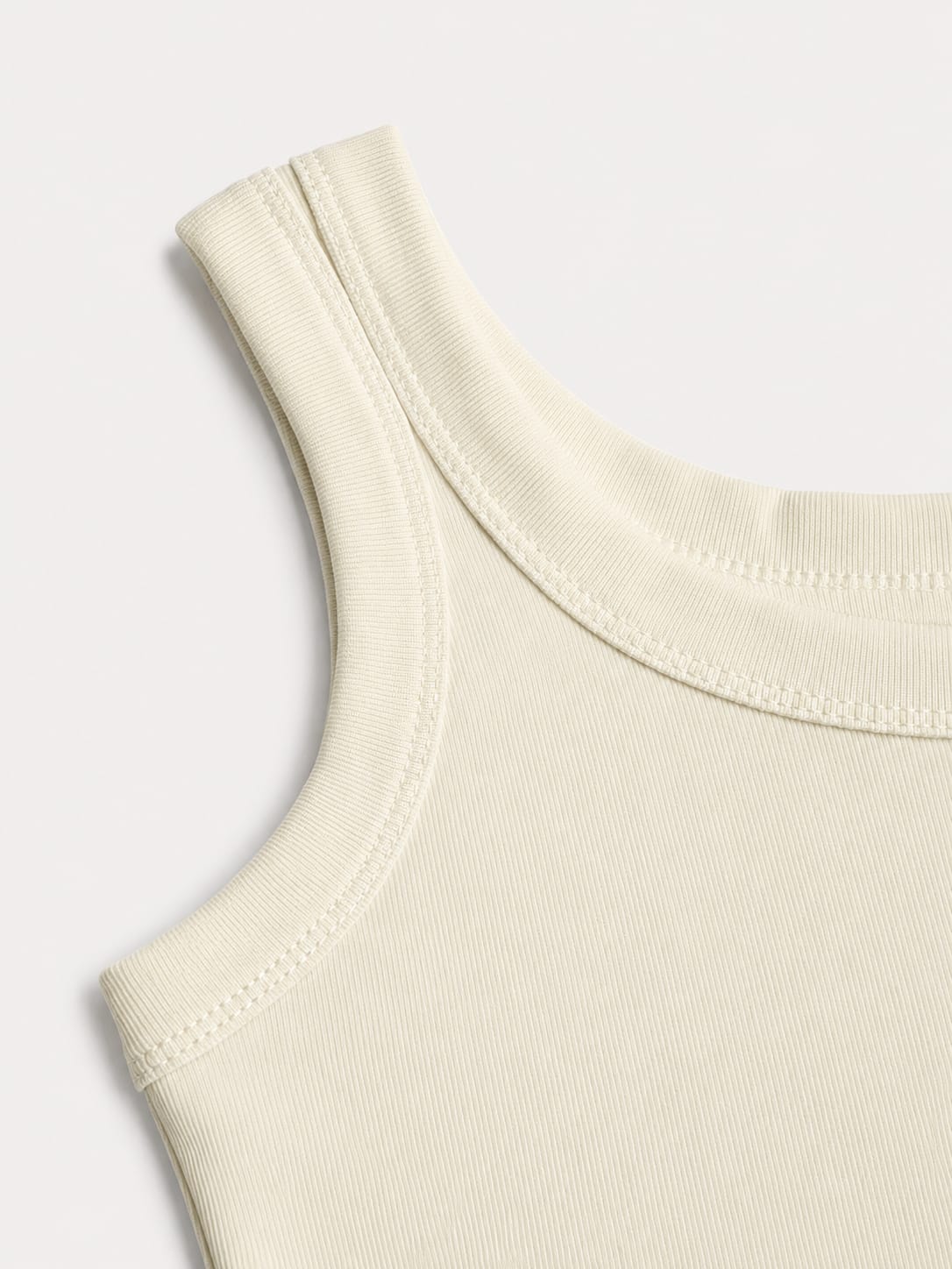white ribbed tank top with a fitted stretch design and modern minimal style by NUR